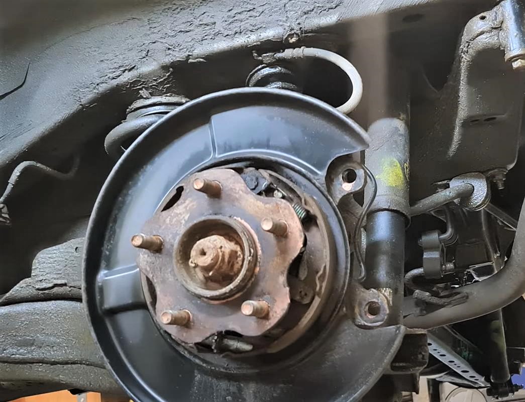 Замена колодок ручника Ниссан