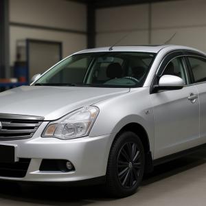 Ниссан Альмера после замены лобового стекла в автотехцентре