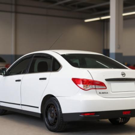 Ниссан Альмера после замены стеклоподъемника в автотехцентре