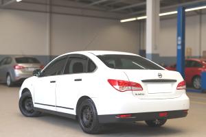 Ниссан Альмера после замены стеклоподъемника в автотехцентре